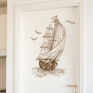 Retro sailboat wall sticker in brown monochrome design with seagulls on white door