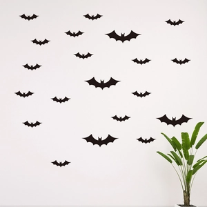 Black bat silhouette wall stickers set for Halloween party decor on white wall background