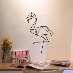 Modern black geometric flamingo wall sticker in a minimalist living room setting