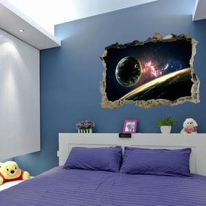 Detail of 3D cracked wall sticker with luminous planets and nebula for home decor