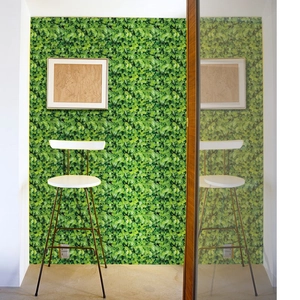 Self-adhesive PVC wallpaper featuring green leaf patterns for home wall decoration