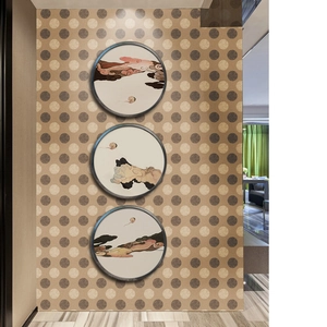 Three-piece round wall art set with abstract clouds in black frames for living room