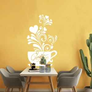 Detail von Kaffeetasse Wandtattoo mit Schnörkeln und Herzmotiven auf gelber Wand