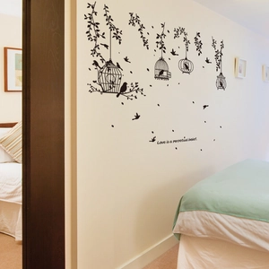Artistic black birdcage and vine wall sticker with Love is a perpetual belief quote