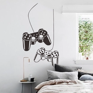 Detail showing creative game controller wall stickers in a modern minimalist bedroom setting
