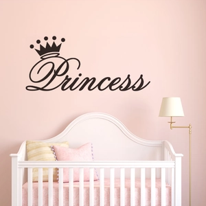 Detail view of black Princess crown wall decal sticker on a pink bedroom nursery wall