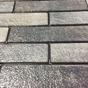 Detail shot of 3D grey stone brick wall sticker with realistic textured matte finish