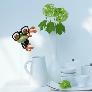 Funny green frog wall sticker showing a cartoon frog in suit peeking behind objects