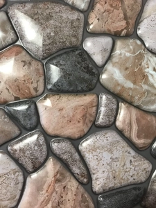 Macro detail of 3D pebble textured PVC wall sticker with glossy stone finish