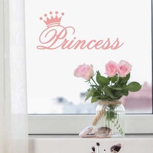 Pink Princess crown wall sticker displayed on window with elegant vanity accessories