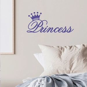 Detail view of purple Princess wall sticker with crown design in a cozy bedroom setting