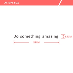 Detail view of 'Do something amazing' wall decal with 55cm length measurements