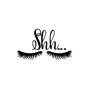 Close-up of black 'Shh...' text and long eyelash wall sticker in minimalist style