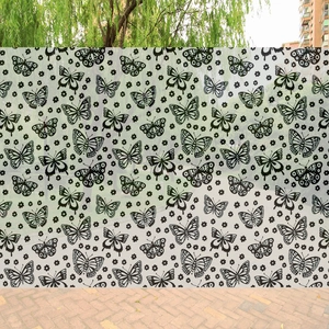 Frosted window film with black butterfly and floral patterns for home privacy and decoration