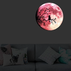 Sticker mural lune rose lumineuse avec silhouette de chat noir sur une branche d'arbre