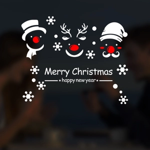 Détail de stickers muraux de Noël avec motifs de Père Noël, bonhomme de neige et renne