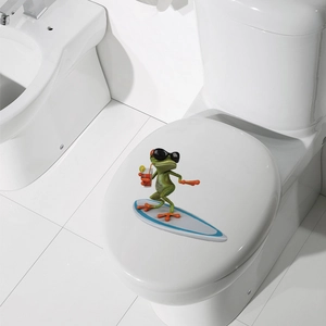 3D cartoon frog sticker with sunglasses and drink on a white toilet lid detail view