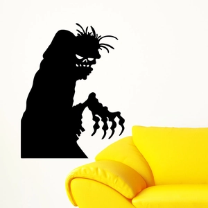 Spooky black silhouette monster wall sticker for Halloween decor on white background