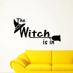Halloween wall decal with 'The Witch is in' lettering, witch hat and broom graphics