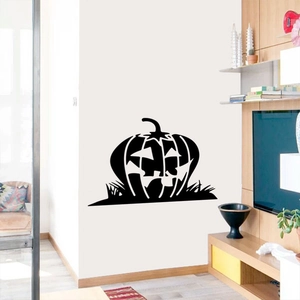 Halloween Jack-o'-lantern black PVC wall sticker with grass design on a white wall