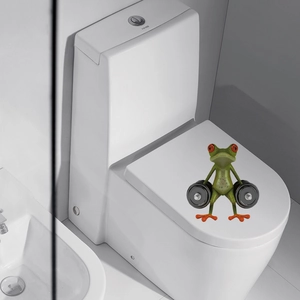 Funny green frog lifting dumbbells sticker on white toilet lid, creative waterproof bathroom decor