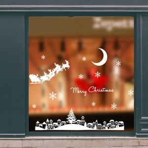 Christmas window decals with Santa Claus sleigh, snowflakes and snowy village silhouette