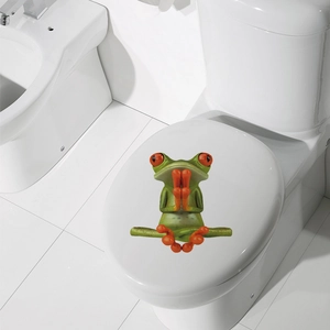 3D green tree frog sticker in meditation pose on white toilet lid, waterproof PVC decal
