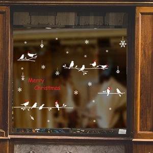 Christmas window stickers featuring white birds and Merry Christmas text for glass decor
