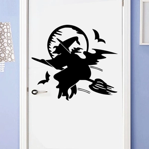 Detail view of black Halloween vinyl wall sticker featuring a witch silhouette and bats