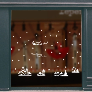 Stickers de fenêtre de Noël blancs avec flocons, étoiles et silhouettes de maisons d'Europe