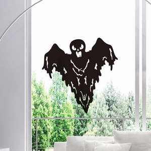 Close-up of black ghost and bat window stickers for Halloween home wall decoration