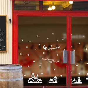 Autocollants de Noël blancs avec traîneau du Père Noël, flocons et silhouette de ville