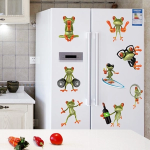 Detailed set of 7 3D cartoon frog stickers in various poses on a white refrigerator
