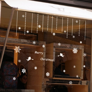 White snowflake window stickers with Cupid and Merry Christmas text for holiday decoration