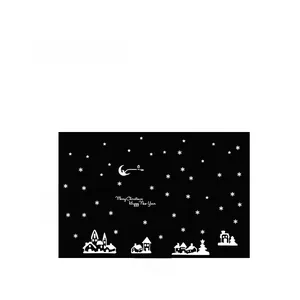 Sticker mural de Noël avec silhouette de ville enneigée et lettrage de Joyeux Noël