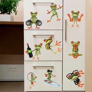 Detailed view of creative 3D frog decals applied on white cabinet for home decoration
