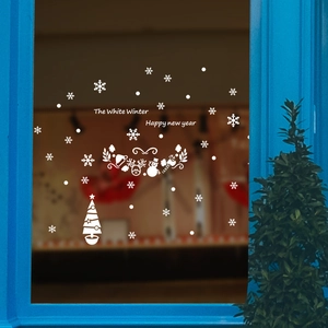 White Christmas snowflake window stickers with Happy New Year text for holiday glass decor