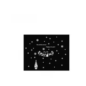 Detail view of white Christmas window decals set showing 100x80cm layout and winter patterns