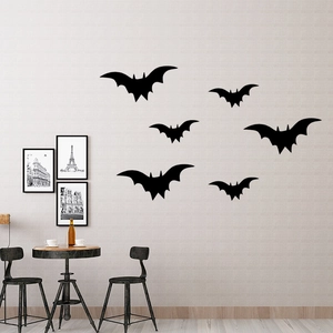 Detail of assorted black bat wall decals in various sizes for Halloween home decor