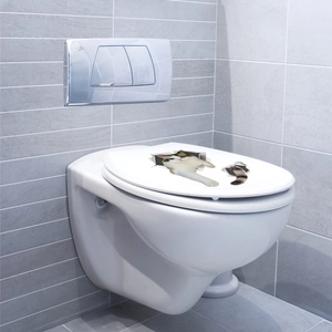 Detail of 3D calico cat wall sticker showing realistic cat tail and head on a white toilet