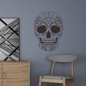 Black Sugar Skull wall decal with floral patterns on minimalist grey living room wall