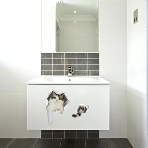 3D cartoon cat wall decal with creative broken hole effect on a bathroom cabinet