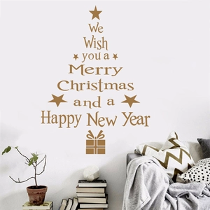 Golden Christmas tree wall sticker with holiday greetings in a cozy living room setting