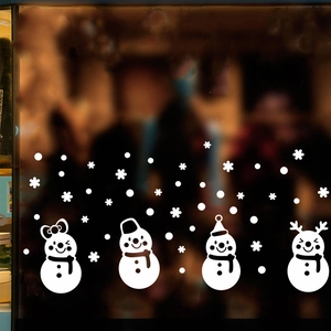 Christmas window stickers featuring cute white cartoon snowmen and falling snowflakes decor