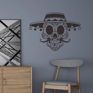 Detail of Day of the Dead sugar skull wall decal on a modern living room blue wall