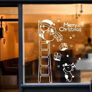 White Christmas window sticker with cartoon bear climbing ladder and reindeer