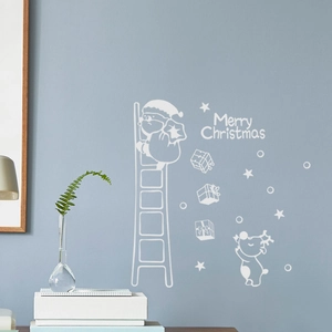 Detailed view of Merry Christmas wall stickers with white Santa Claus climbing a ladder