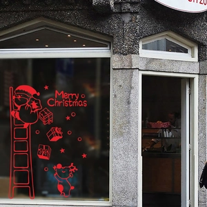 Festive Christmas wall stickers with Santa climbing ladder and reindeer window decals