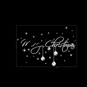 White Merry Christmas wall decal with stars and snowflakes sized 74cm x 44.5cm