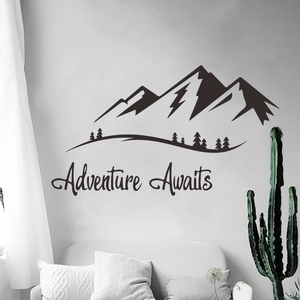 Adventure Awaits vinyl wall decal featuring minimalist mountains and pine trees